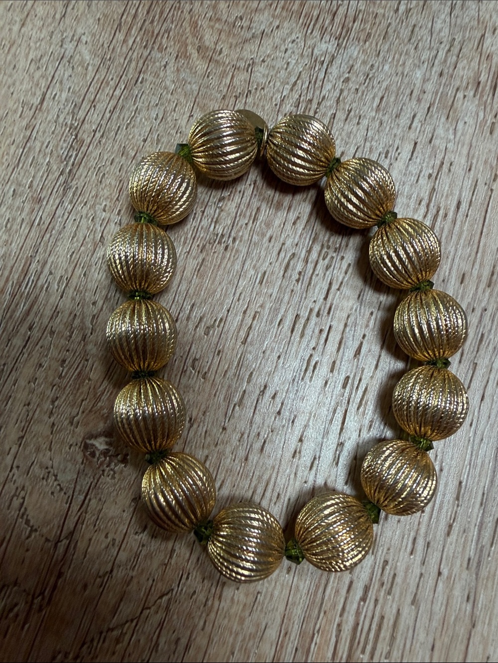 Tarina Tarantino Gold Ribbed Bead Bracelet with Green Knots